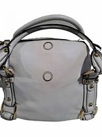 Front view of grey leather handbag showing exterior texture, hardware, and handles.