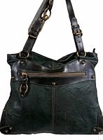Front view of dark green leather bag with black leather detail, brass zipper and rivets, and adjustable strap.
