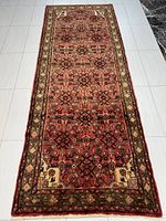 Full top-down view of runner rug on tiled floor