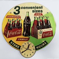 Front view of the colorful Coca Cola wall clock showing the graphic of three bottle sizes and the working clock face.
