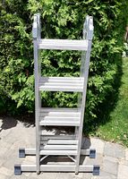 Front view of folded ladder showing overall condition