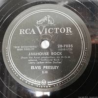 Close-up photo of the Elvis Presley Jailhouse Rock record label showing RCA Victor branding and track details.