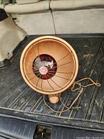 Front view of Beaver No 5 space heater showing reflector, grille and heating element