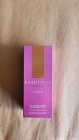 Front of unopened purple Beautiful Love Estee Lauder box