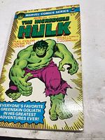Front cover showing The Incredible Hulk in green with torn purple pants, large text title, and full color.