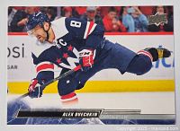 Front side of Alex Ovechkin hockey card in action pose, showing team uniform and branding.
