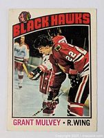 Front of Grant Mulvey hockey card showing player in Blackhawks uniform, card number 167, near mint condition.