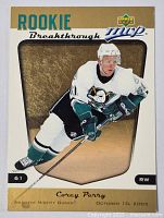 Front of Upper Deck MVP Rookie hockey card featuring Corey Perry in Anaheim Mighty Ducks uniform, labeled 'Rookie Breakthrough MVP' with date October 10, 2005.
