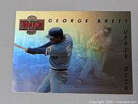 Front holographic image of George Brett baseball card with Then & Now logo.