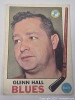 Front close-up of Glenn Hall hockey card showing the player portrait, St. Louis Blues logo, and identification text.