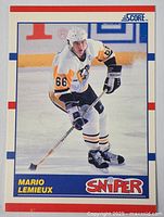 Front of the Score Mario Lemieux hockey card showing the player in action wearing number 66 in Pittsburgh Penguins uniform.