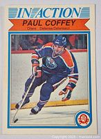Front of the 1982 O-Pee-Chee 'In Action' Paul Coffey hockey card showing player in action in an Edmonton Oilers uniform.