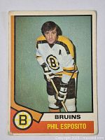 Full front view of Phil Esposito Bruins hockey card showing player in uniform, card details, and condition.