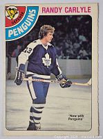 Front side of the Randy Carlyle hockey card showing the player in Toronto Maple Leafs uniform with Penguins logo and name at top.