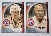 Photo of two Upper Deck hockey cards featuring Mario Lemieux (Penguins) and Gordie Howe (Whalers) showing front portraits and logos.