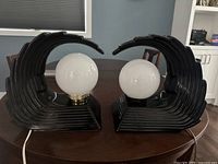 Front view of both lamps side by side on table showing overall appearance