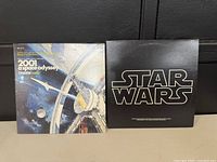 Front view of the pair of vintage LP record sleeves: '2001 A Space Odyssey' and 'Star Wars'.