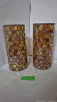 Front view of both mosaic glass vases