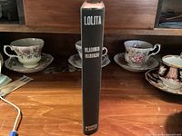 Book spine showing title Lolita, author Vladimir Nabokov, publisher Weidenfeld & Nicolson