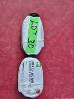 Two rolled bicycle inner tubes, one showing 700 x 32-35C MEC label