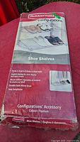 Front of boxed Rubbermaid Configurations shoe shelves accessory