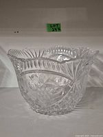 front view showing cut glass bowl patterns and scalloped rim