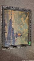 Full view of framed windmill painting