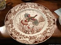 Front view of Johnson Brothers Windsor Ware Wild Turkeys dinner plate