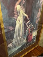 Front angled view of framed print showing princess knighting the kneeling knight in a richly detailed medieval scene.