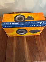 Box of JL Audio Evolution VR650-CXI speakers showing front with product images and brand logos.