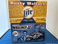Front view of the collectible's packaging showing Rusty Wallace's name, Miller Lite logo, and image of the stock car and driver.