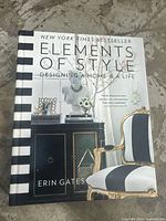 Front cover of the book showing title, author Erin Gates, and design room interior image.