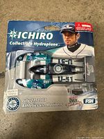 Front of original packaging showing hydoplane model boat and player image