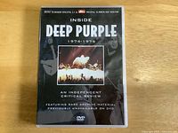 Front cover of Deep Purple DVD titled 'Inside Deep Purple 1974-1976' showing a concert photo and text describing the DVD content.