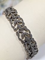 Close-up view of the sterling silver marcasite bracelet showing the linked patterned design.