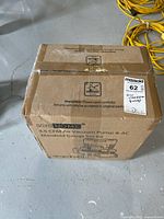 Box of Vivo Home 3.5 CFM air vacuum pump and AC manifold gauge set kit showing sealed cardboard packaging with handling icons and MaxSold tag.