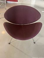 Overhead front view showing seat and back cushions, visible wear on upholstery