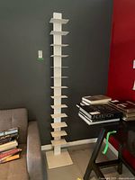 Front view showing entire bookcase with base and multiple shelves