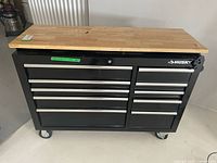 Front view showing 10 drawers and casters