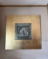 Full front view of large square artwork showing gold foil background and central square embossed elephant panel.