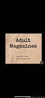 Photo of adult magazines warning cover page with text disclaimer about adult content.
