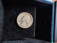 Obverse side of the 1945 silver quarter showing George Washington's portrait and inscriptions.