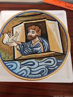 Front view of Giuseppe first edition limited edition collector plate with mosaic style artwork of man and dove