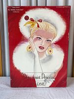Front of original red box featuring artwork of Barbie in winter attire, part of The Winter Princess Collection