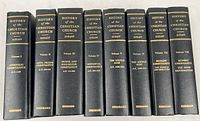 Complete set of eight volumes in black leather-textured hardcover with gold embossed titles on spine.
