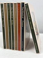Eight volumes from the Time-Life Library of Art series, all standing upright showing their spines and slipcases; various colors, two volumes of Van Gogh included.