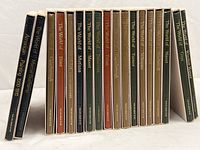 Front view of 18 hardcover art books from the Time-Life Library of Art, showing titles and colors of spines.