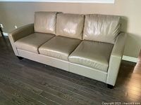 Front view showing three-seat configuration and overall appearance