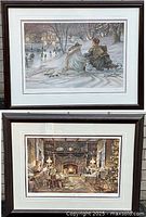 Two framed prints stacked vertically against a brick wall showing both winter scenes.
