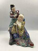 Angled frontal view showing Immortal and attendant